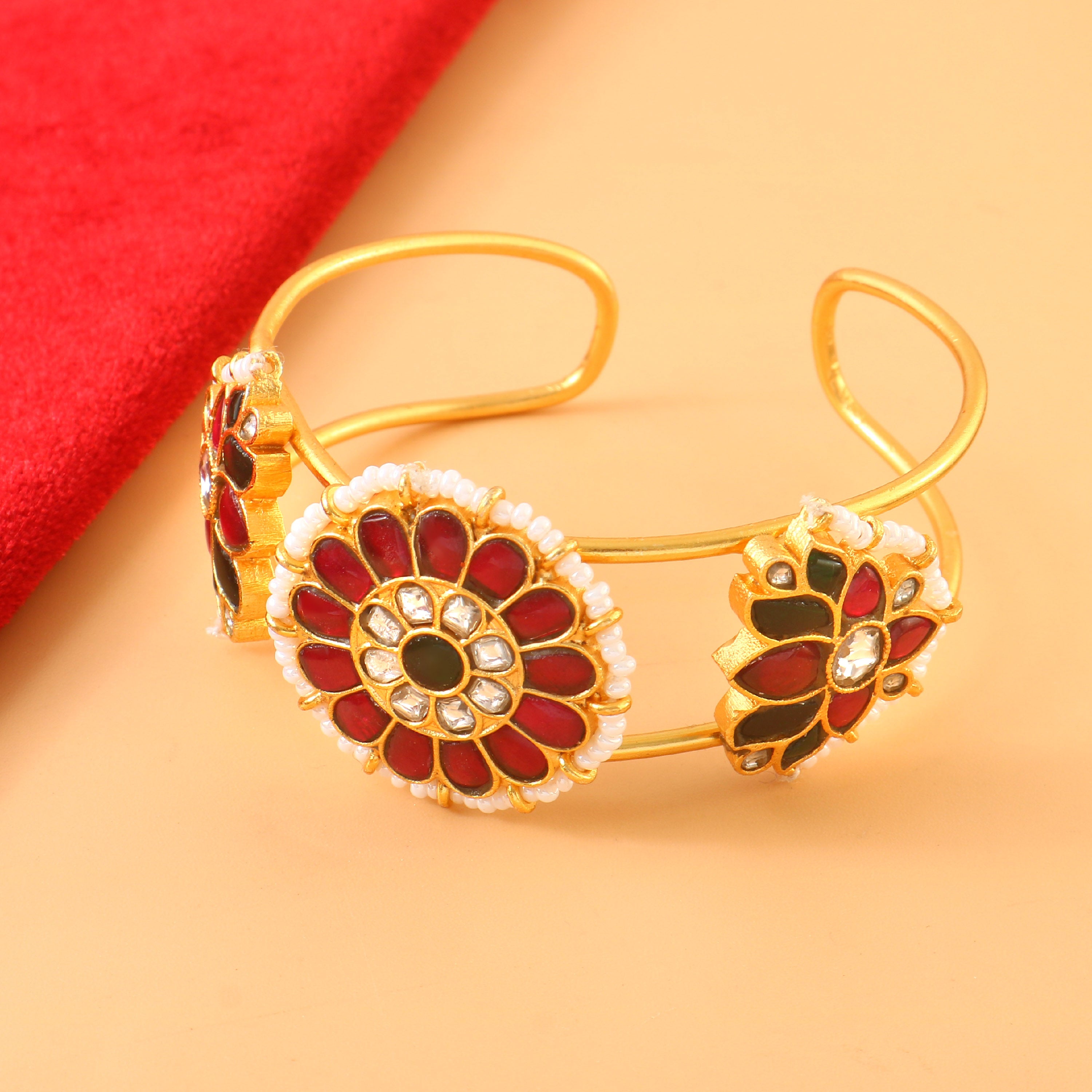 Gold-Tone Kundan Bangle Featuring Round Floral Motifs with Red and Green Enamel Accents