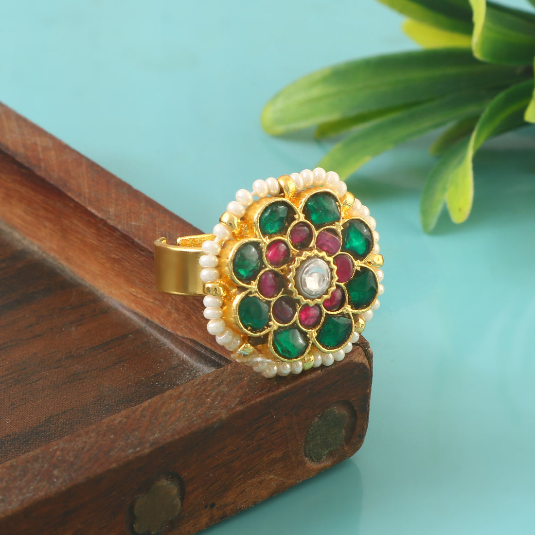 Gold Kundan Rings with Green, Red Stones and Pearl Accents in Floral Design