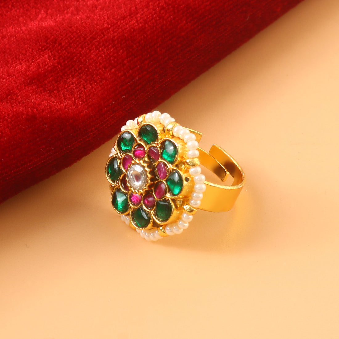 Gold Kundan Rings with Green, Red Stones and Pearl Accents in Floral Design