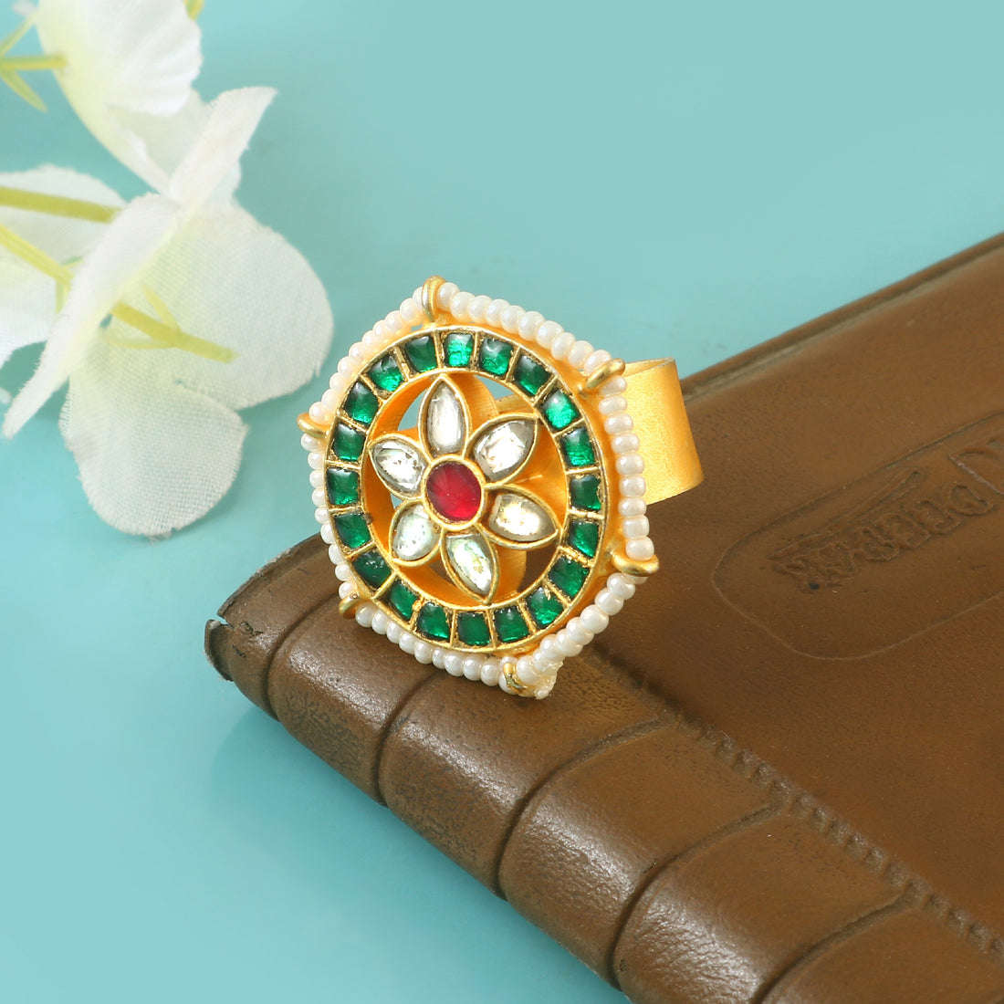 Traditional Floral Jadau Kundan Rings with Green and Red Gemstone Accents