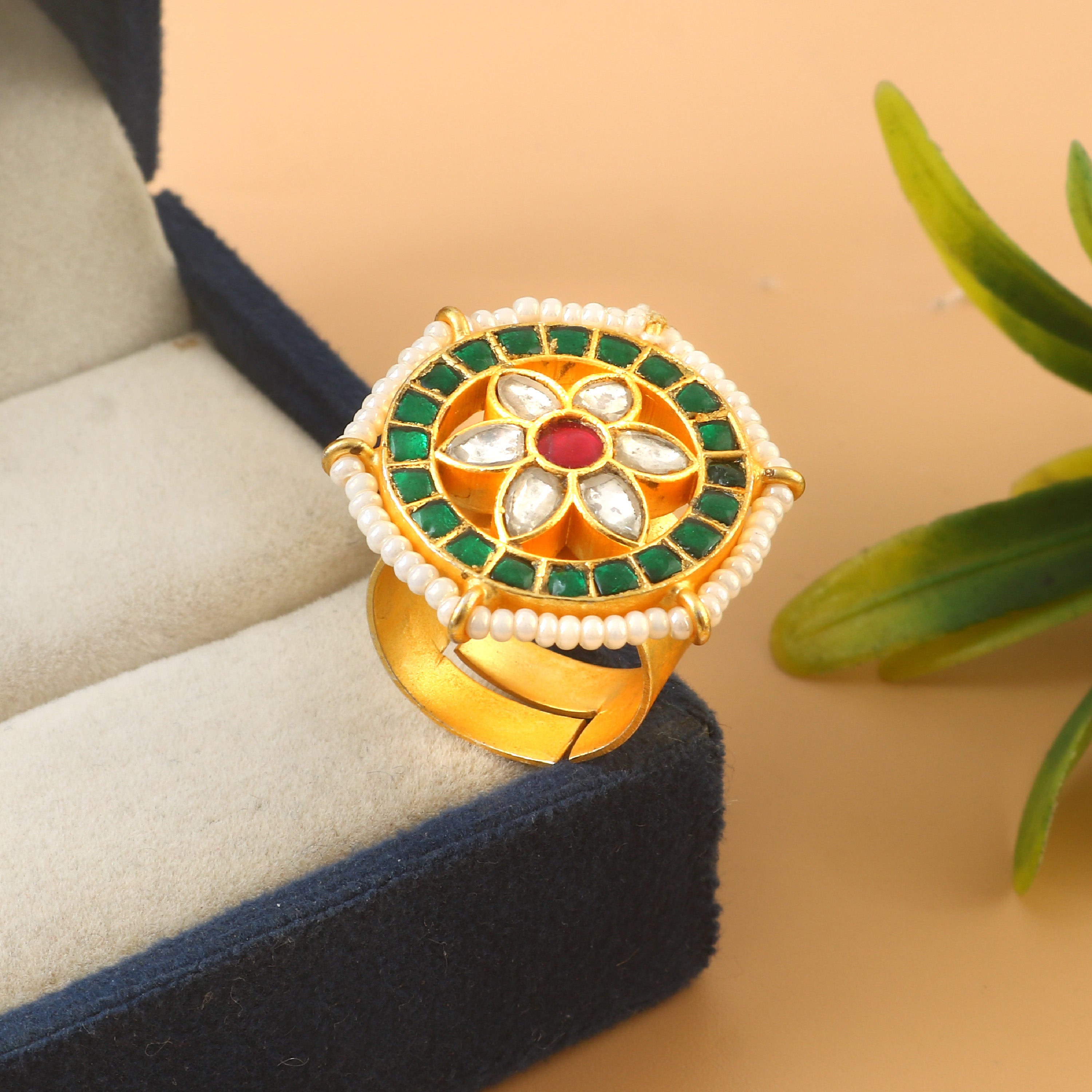 Traditional Floral Jadau Kundan Rings with Green and Red Gemstone Accents